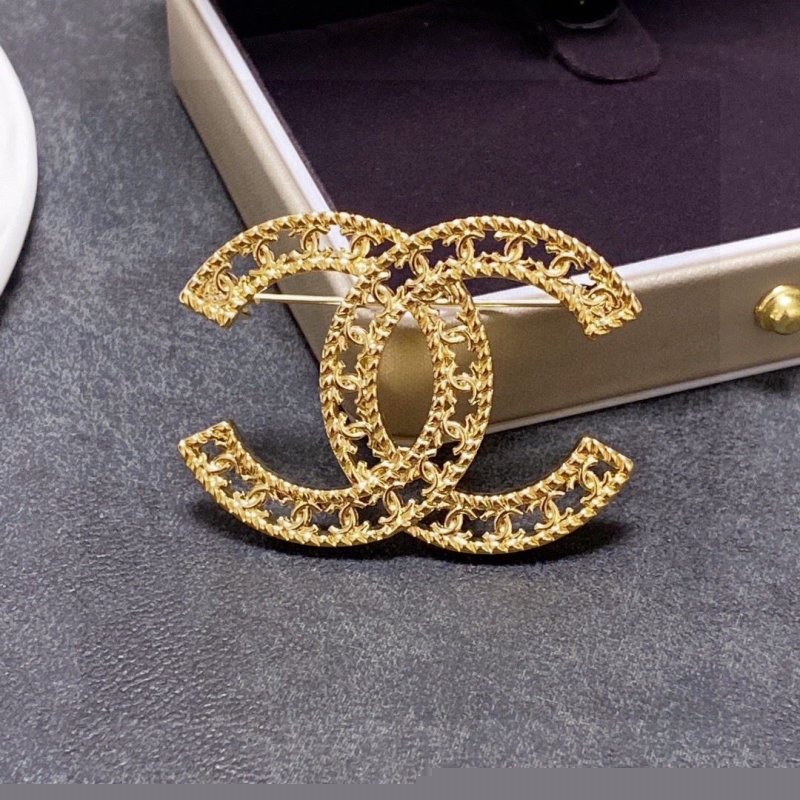 Ch*el brooches